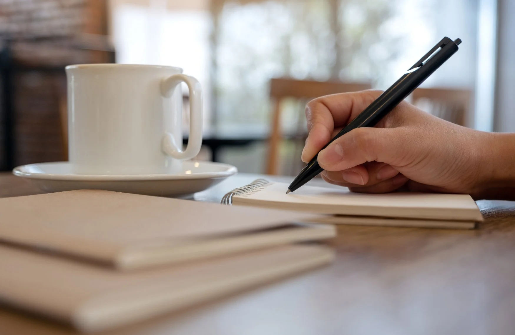 hand writing in a notebook