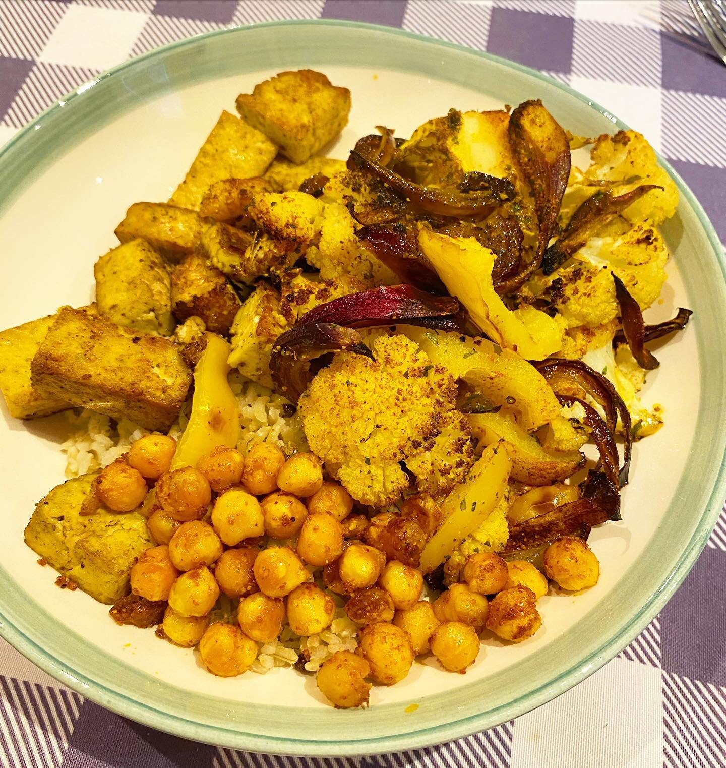 Nutrient packed meal; brown rice (complex carb), chickpeas (fibre, protein), smoked tofu (plant protein), roasted cauliflower with paprika and turmeric (cruciferous vegetable rich in fibre, beneficial for gut + liver health) and red onion (antioxidan