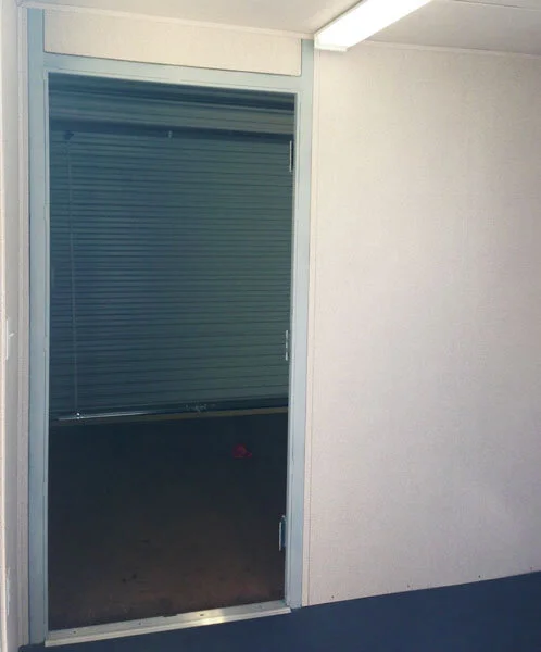 Partition with door kit for standard container