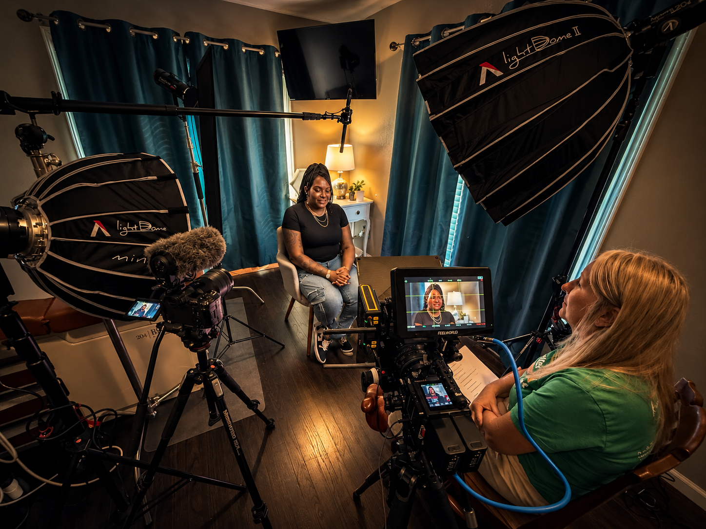 Documentary interview production with professional cinema cameras, lighting and audio equipment.
