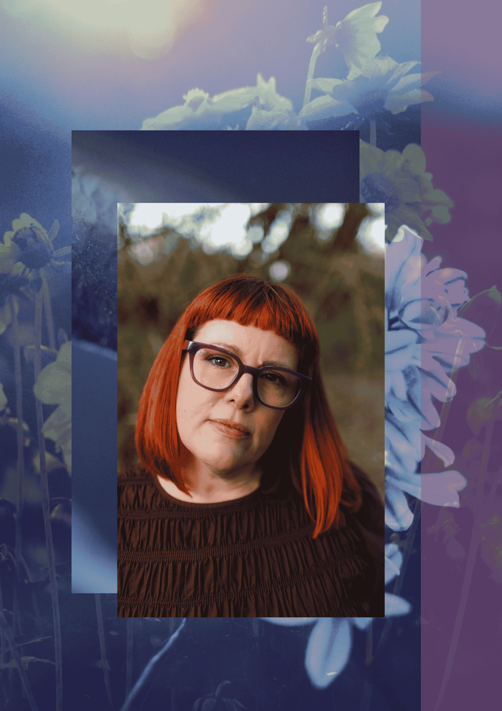 holistic wellbeing: an image of Laura, a woman with red hair and glasses, wearing a purple dress, looking to camera.