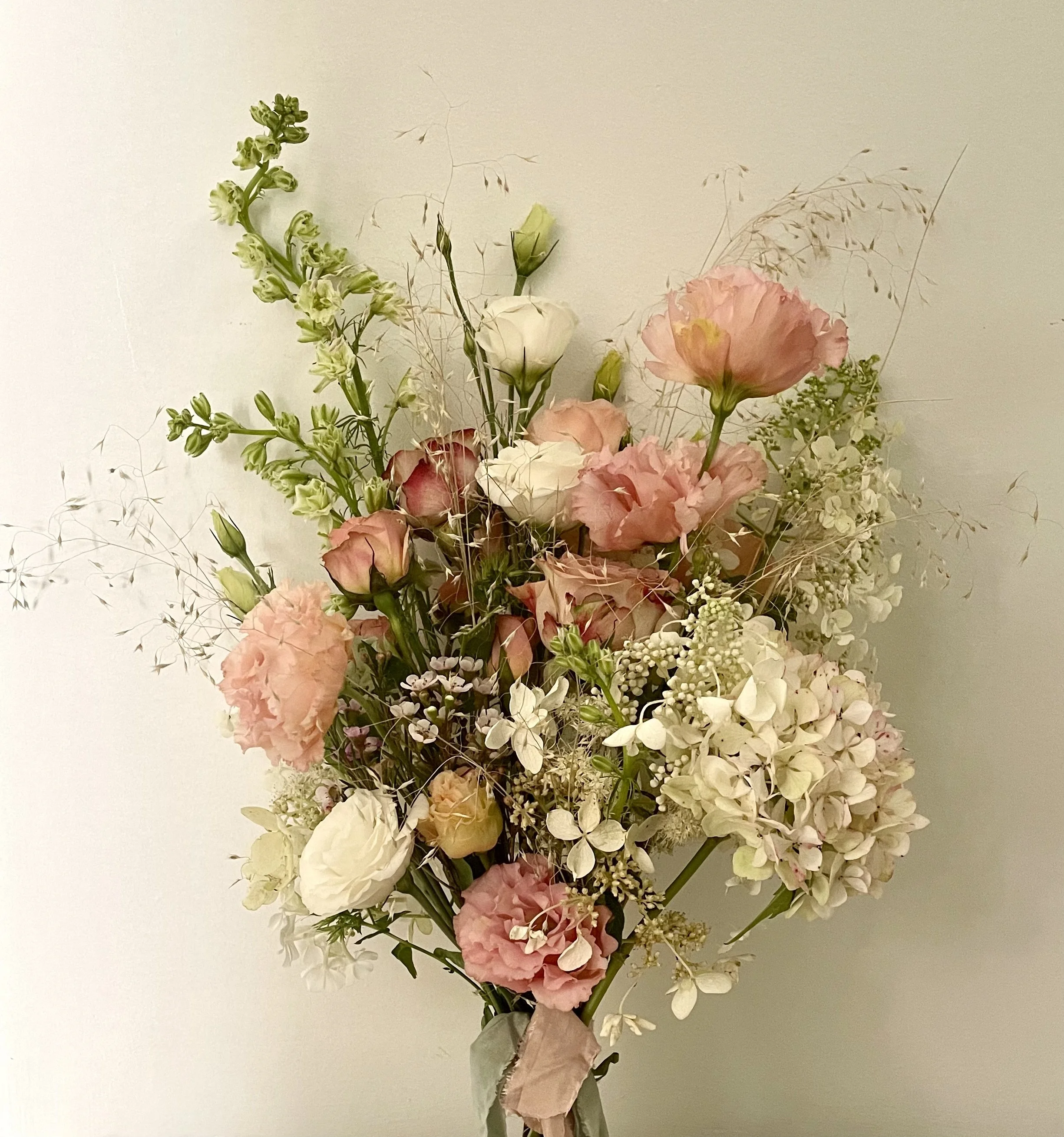 Antique hydrangea peach ranunculus bridal bouquet.jpg