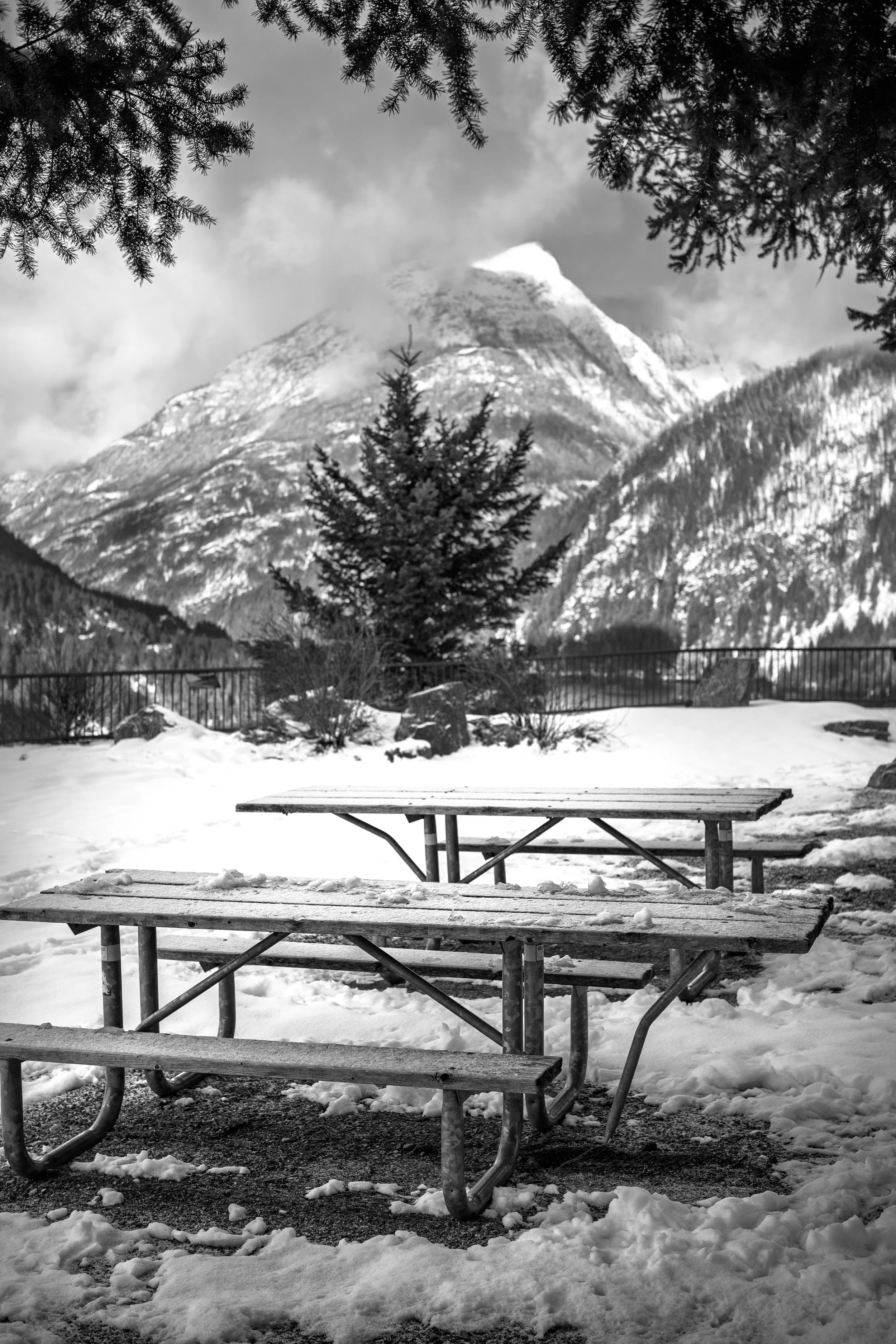 I take photos of picnic tables (from the Diablo Lake overlook)