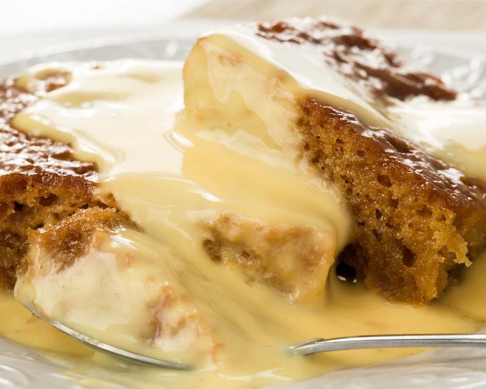 Steamed pudding with custard.png
