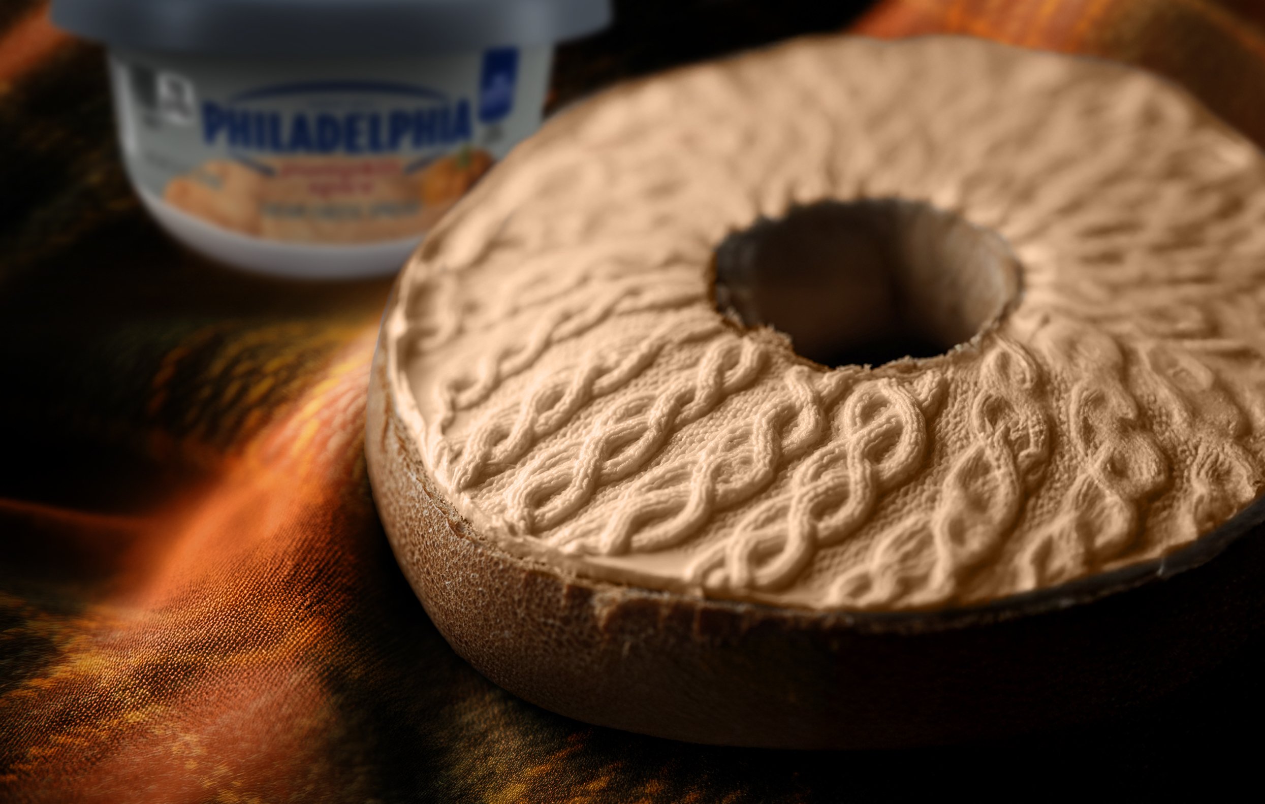 Cream cheese applied to a bagel to resemble the texture of a knit sweater