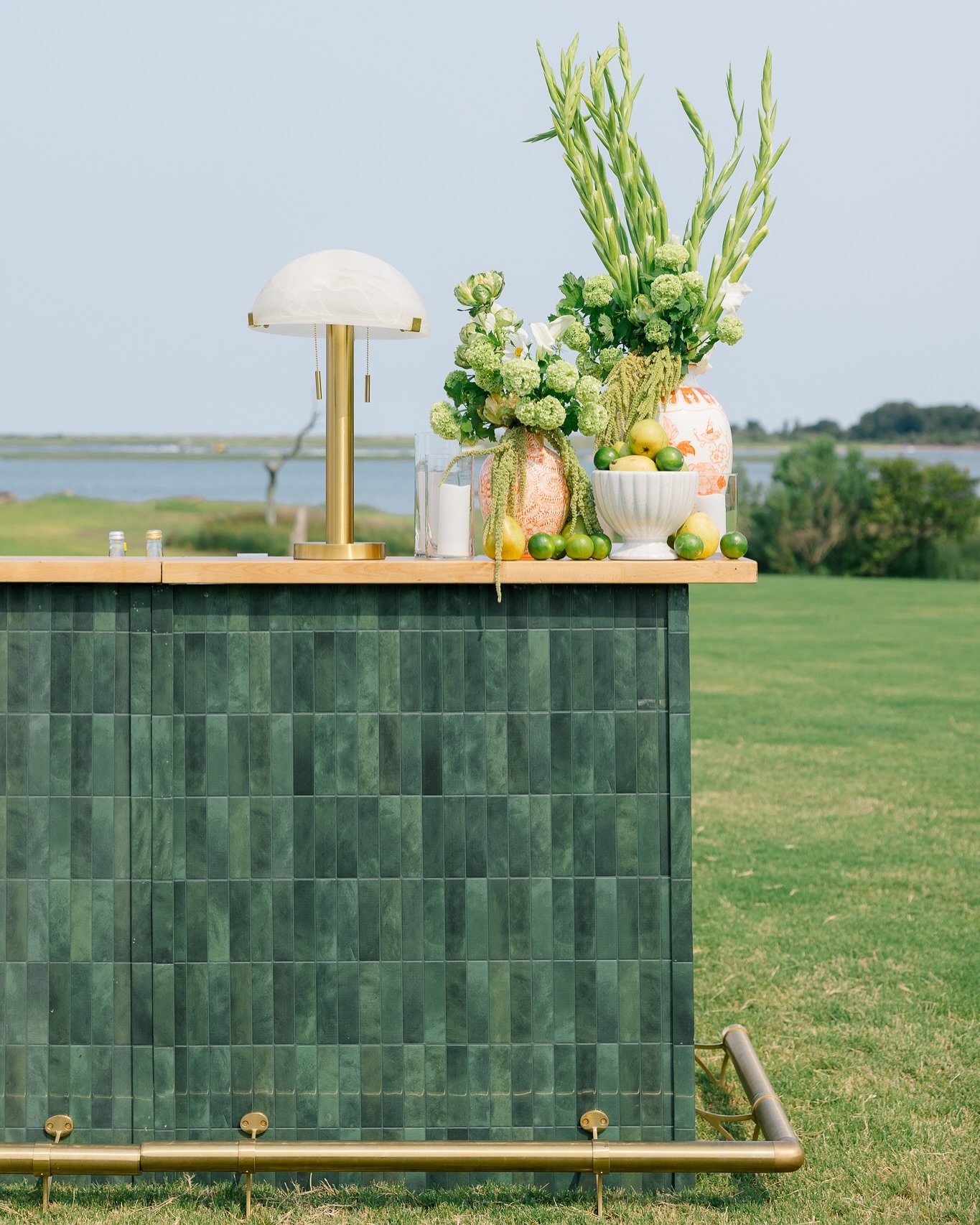 Jameson 24ft bar is a vibe.  The rich green tiles, birch butcher block top and a sleek brass foot rail&hellip;we will never get over how beautiful it is. 🍸

Venue: @liveoaksinspirepreserve
Planner: @anobleeventsanddesign
Photographer: @ashleyclarkep