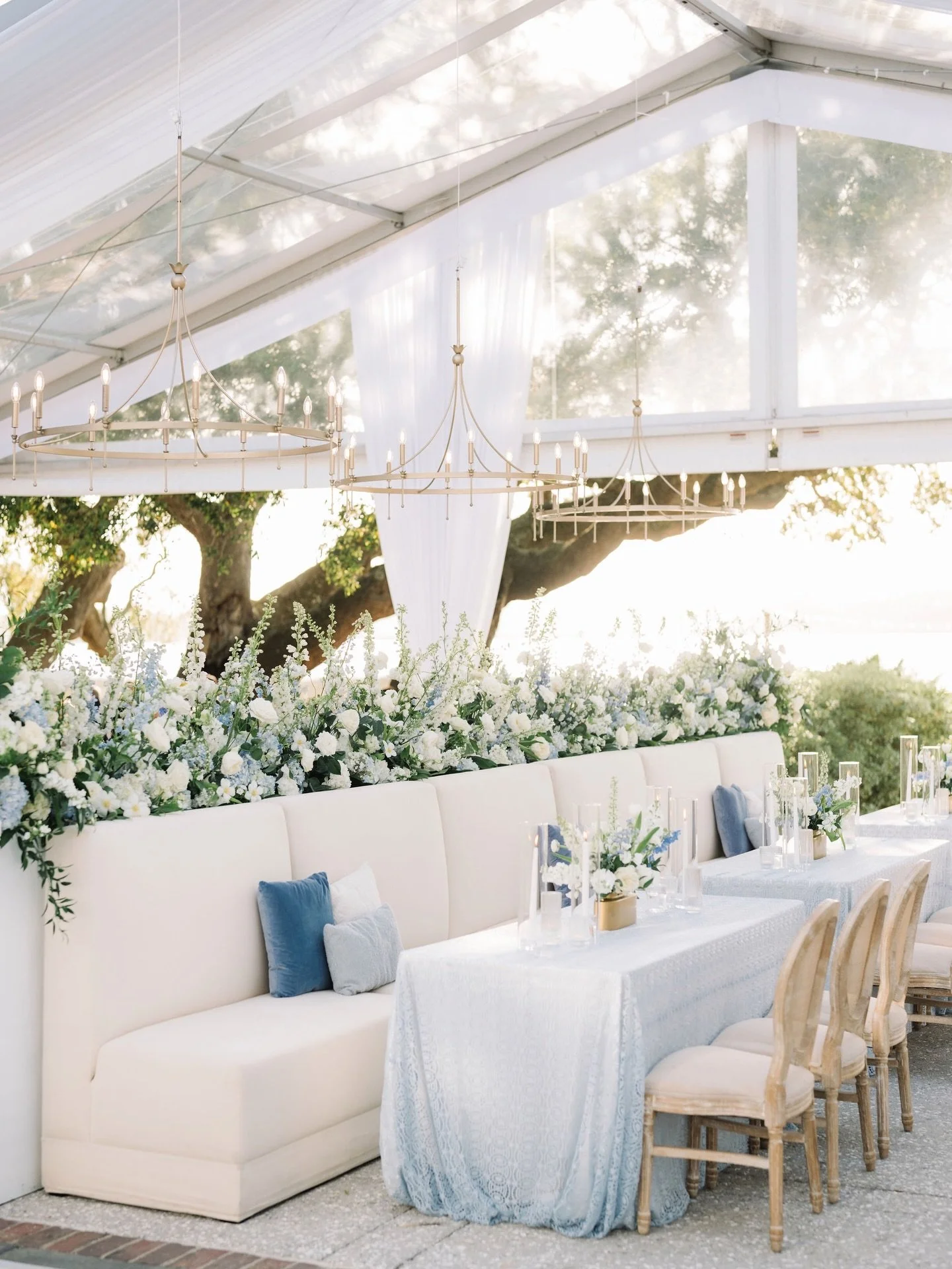 Rentals that feel custom to every celebration 🤍

Our custom Ivy banquettes, layered linens, flowing drapery, our Acadia chairs, and soft blue accents transformed the tent into something that felt equal parts refined and inviting. Proof that the righ