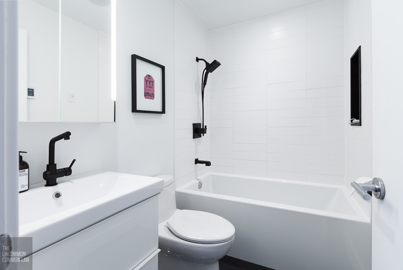   Vanity, mirror, sink faucet:    Ikea   , toilet:    Gerber   , tub:    MAAX   , matte black shower fixtures:    Brizo   , shower niche:    Rubinet    through    SAM Design   , tile:    Cera Gres   , art:    Jud Haynes   , wall color:    Decorators 