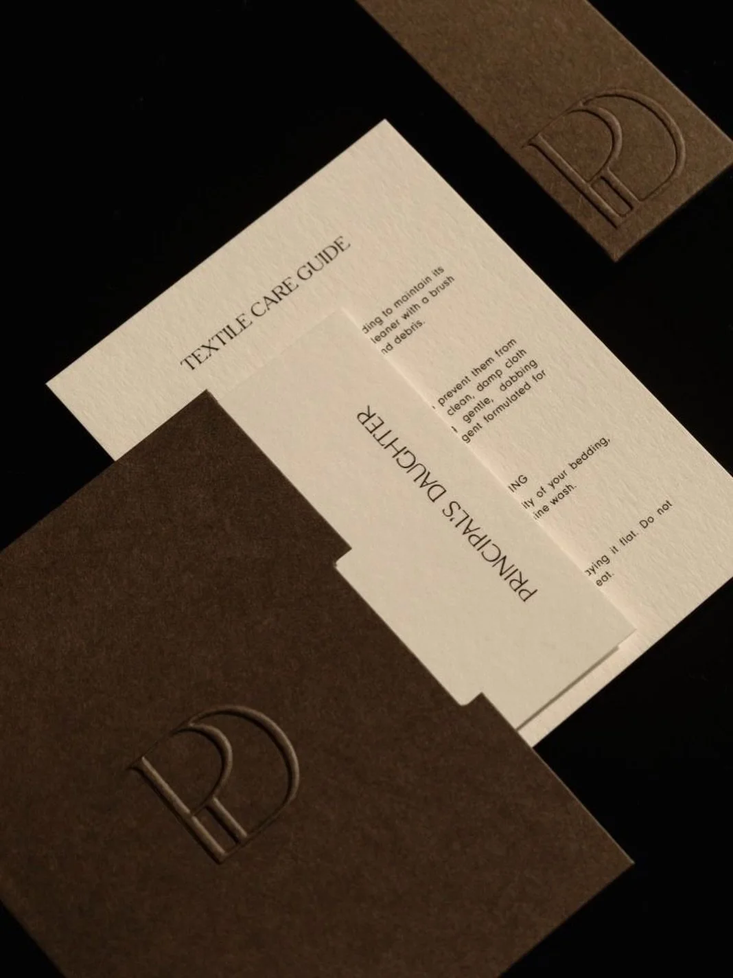 Minimal, tactile composition that highlights refined craftsmanship, tonal restraint, and understated elegance. 
#printdesign #embossing #luxurydesign
