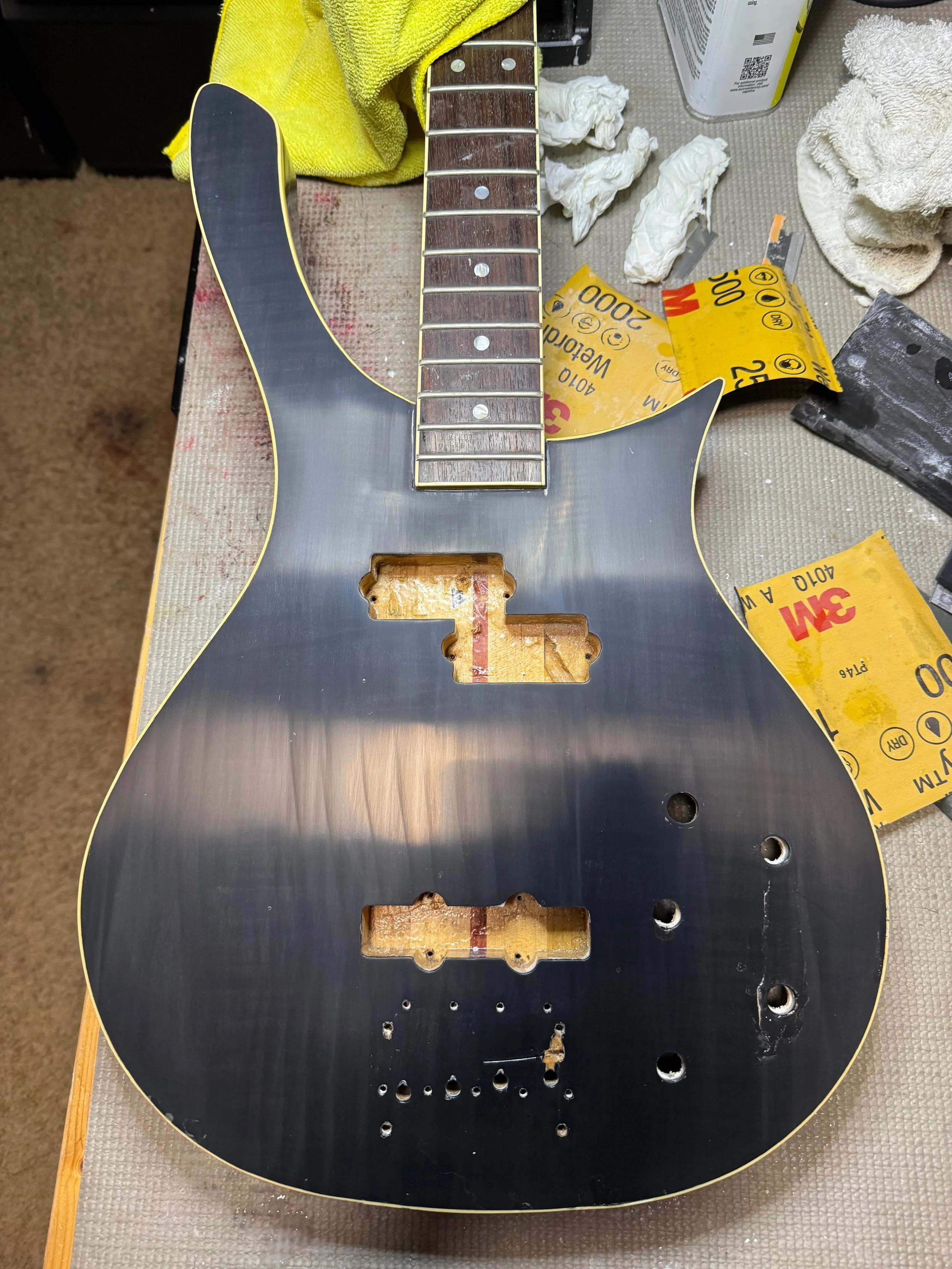 Wet sanding begins to flatten the clear coat