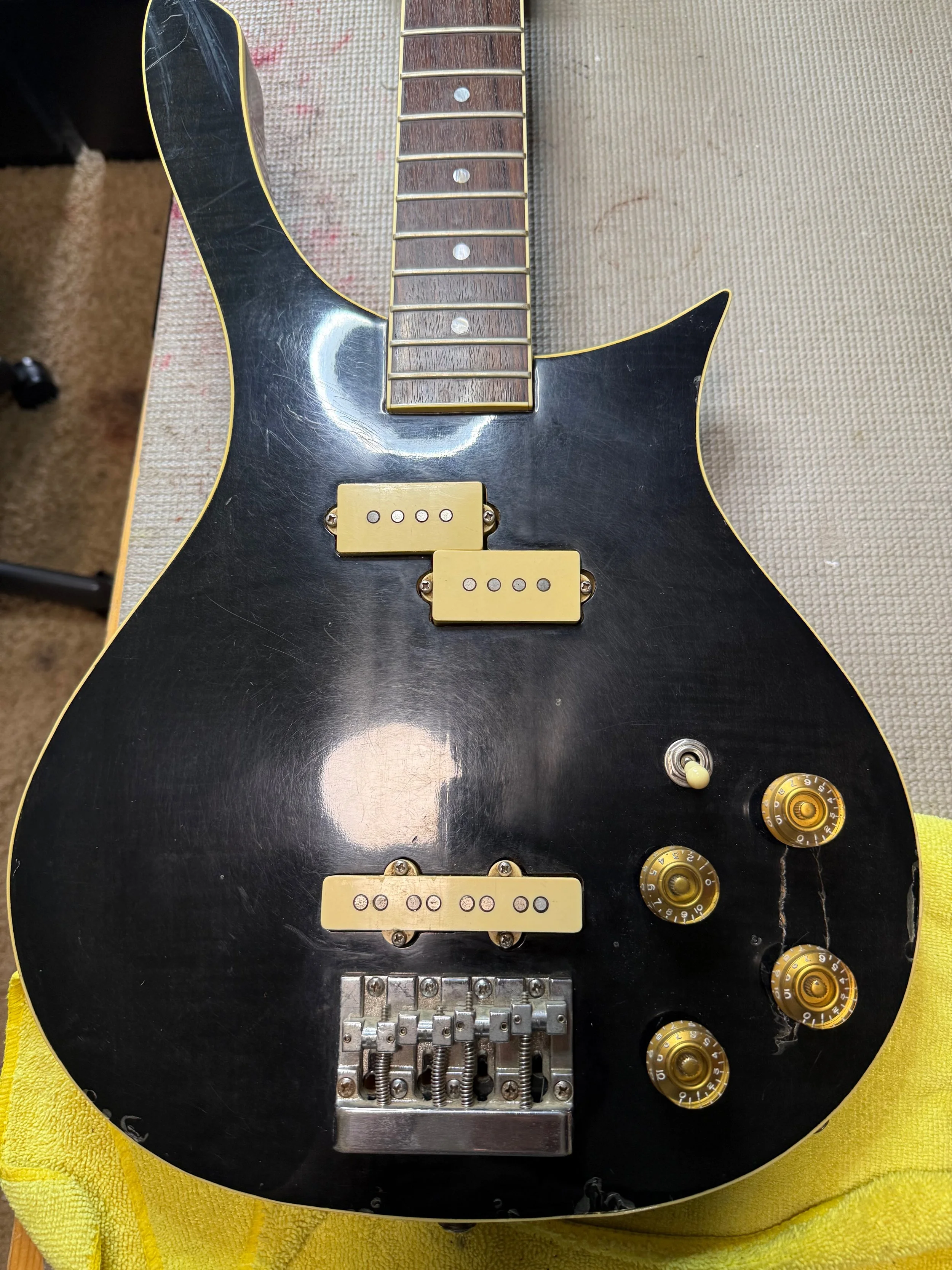 Though the frets and fretboard showed little wear, the body was a different story