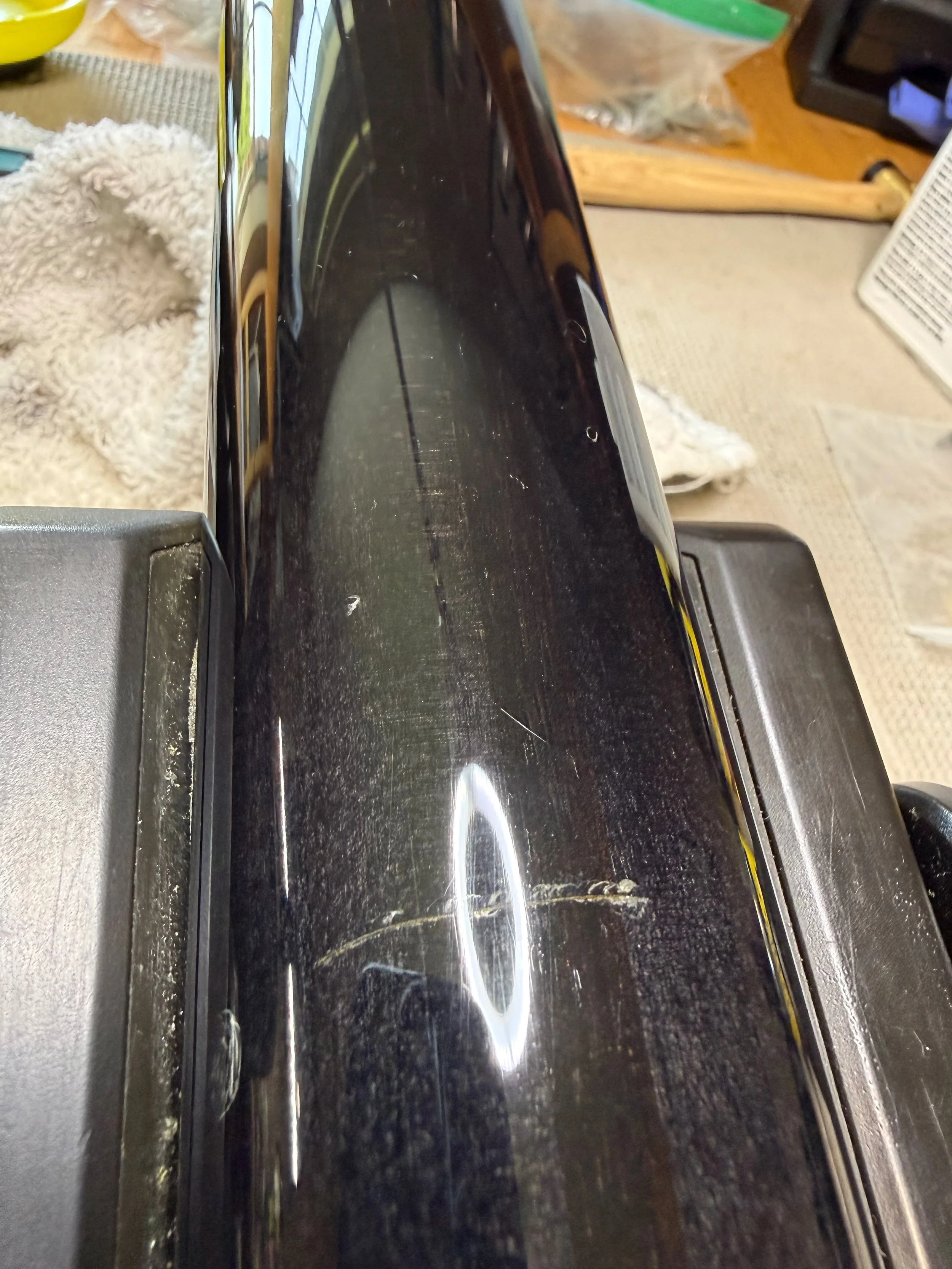 The gouge is filled and sanded. Though visible, you can't feel a thing