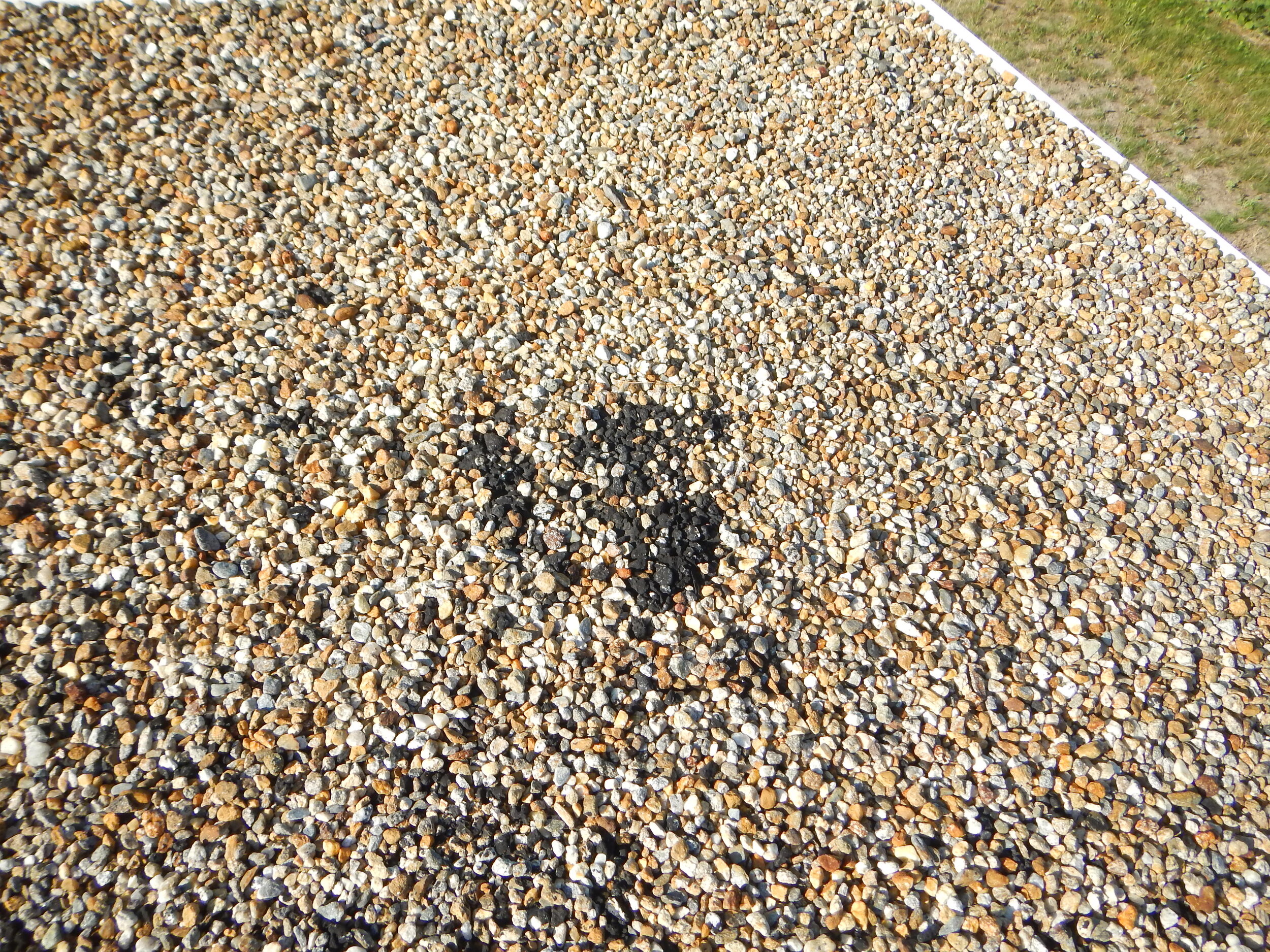 Signs of Failure Gravel Pitch Roof