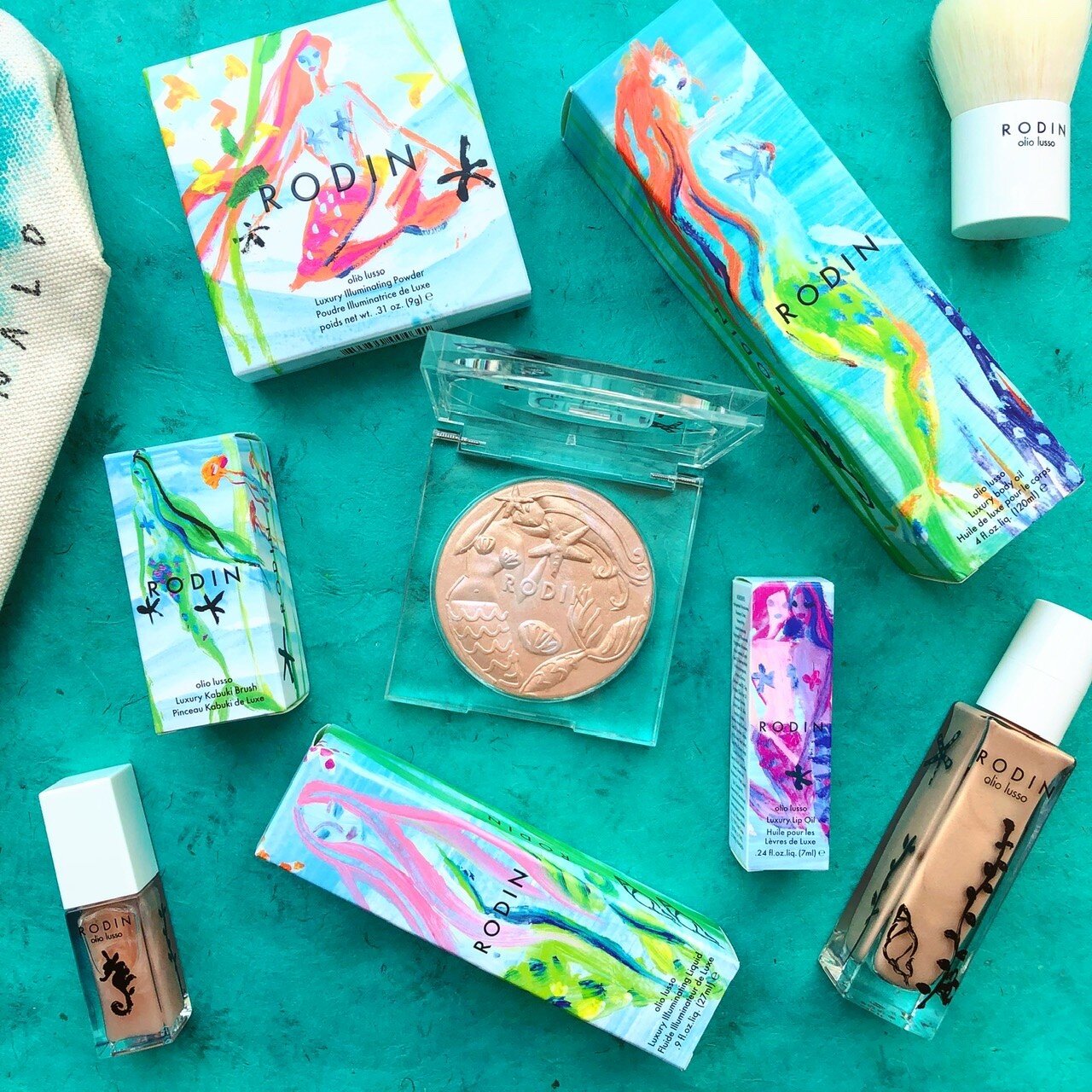   Highlighting Powder, Lip Oil, Face and Body Oil and Liquid Highlighter Rodin Olio Lusso  Summer 2018   Rodin Olio Lusso teamed up with fashion illustrator Donald Robertson to create a whimsical, mermaid-laden underwater fantasy for the packaging of