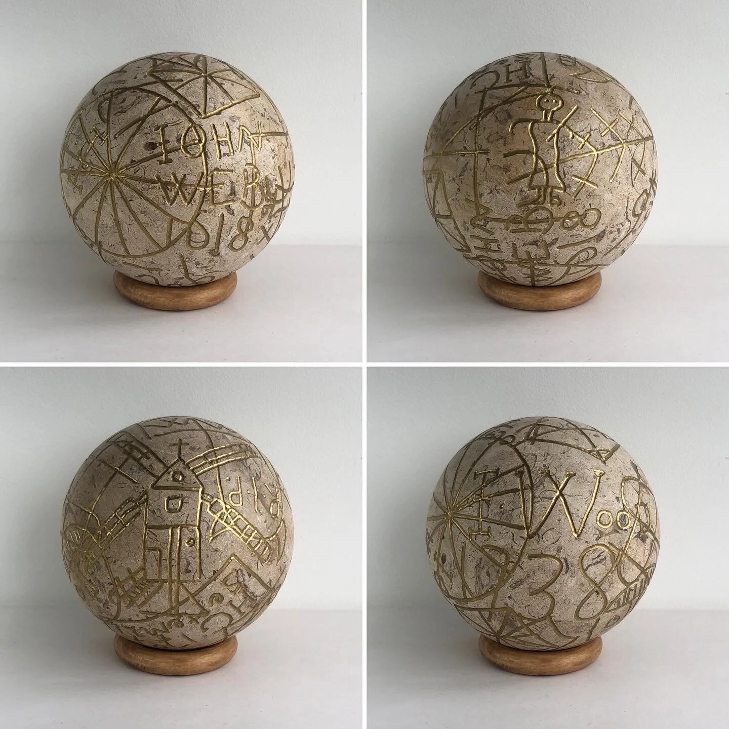   Hangman , 2020, fossil stone, ink and wood, 12cm diameter plus stand 