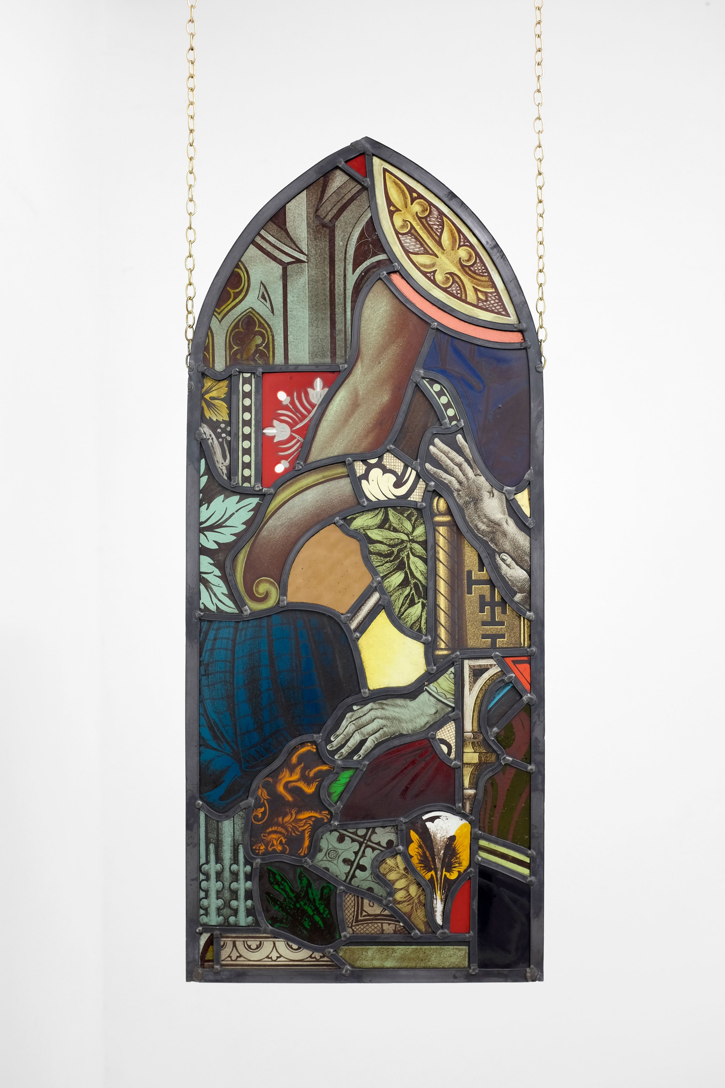   It aint jus behynt us its all roun us , 2021 stained glass fragments, lead, oak, chain 71.5x30cm (leaded glass without gibbet) 