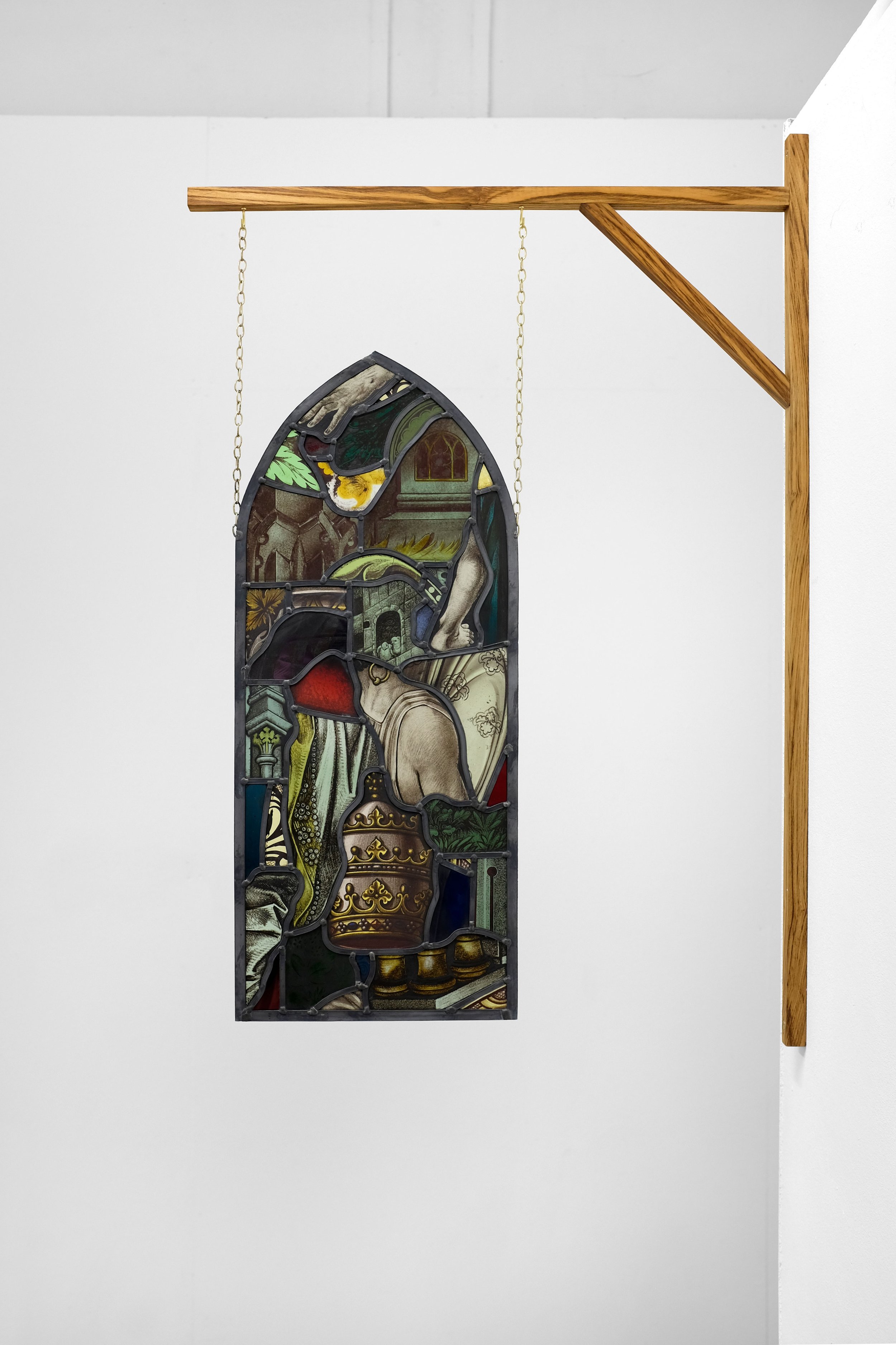  There aint never ben no strait story , 2021 stained glass fragments, lead, oak, chain 71.5x30cm (leaded glass without gibbet) 