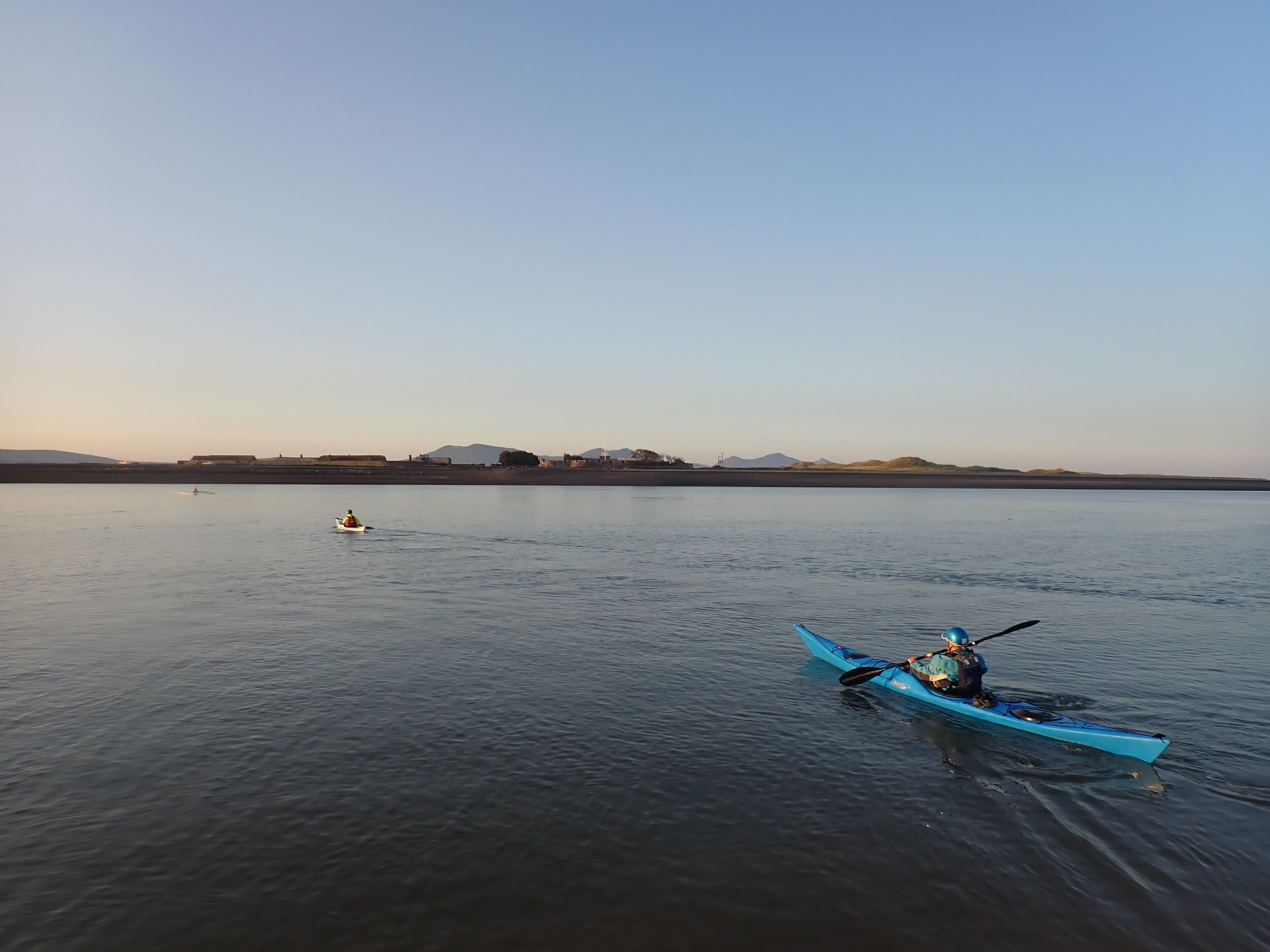 Sea kayaking towards Fort Belan