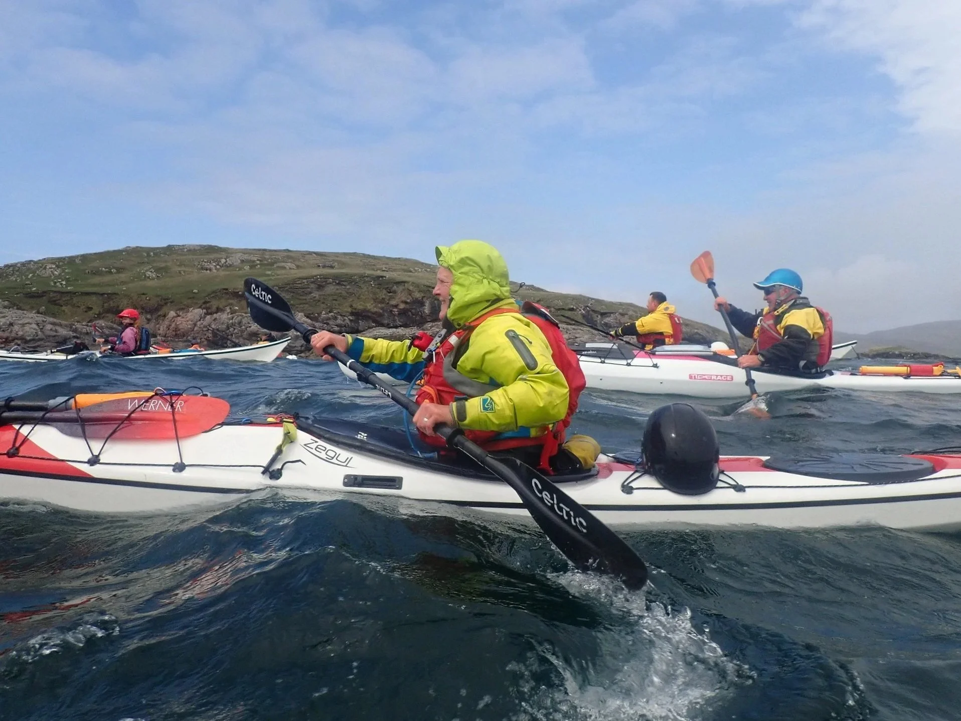 sea-kayakers-assessing-conditions-wind-tide