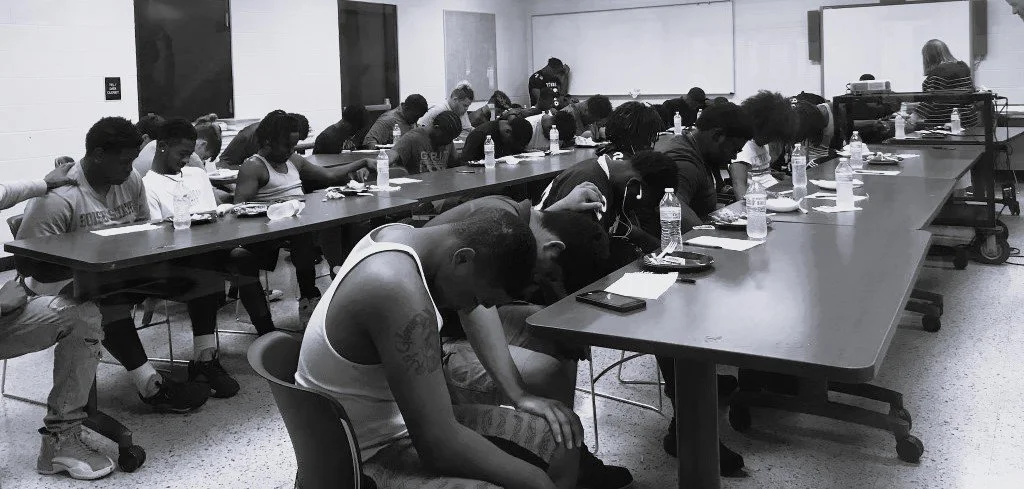 fball prayer bw.jpeg