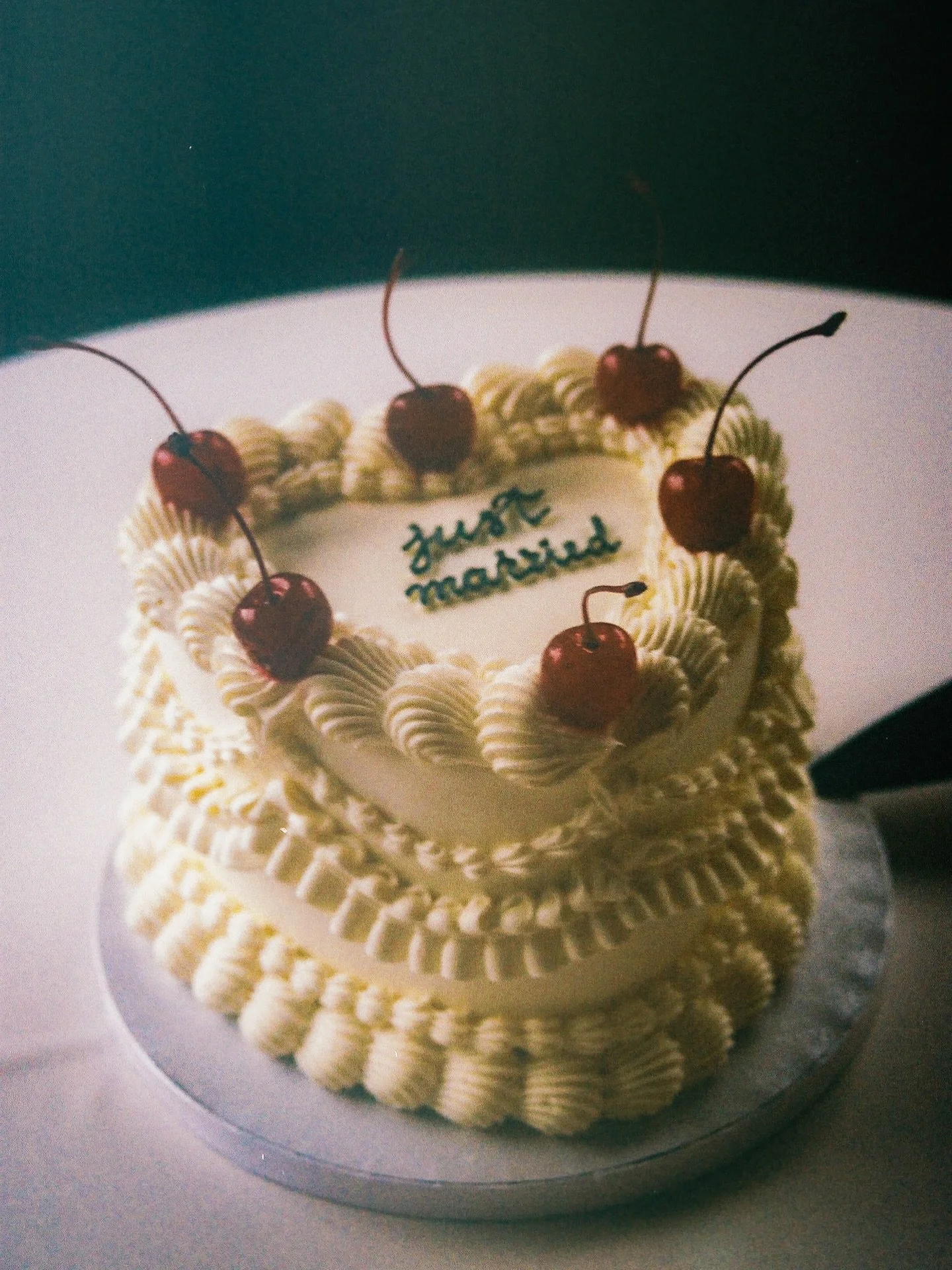 Cherries on a wedding cake, chic cocktails, oysters, colorful dresses and a sweaty dance floor full of best friends is literally my love language when it comes to weddings!!! Film from libby and Wes in Chicago. So many faves 💌