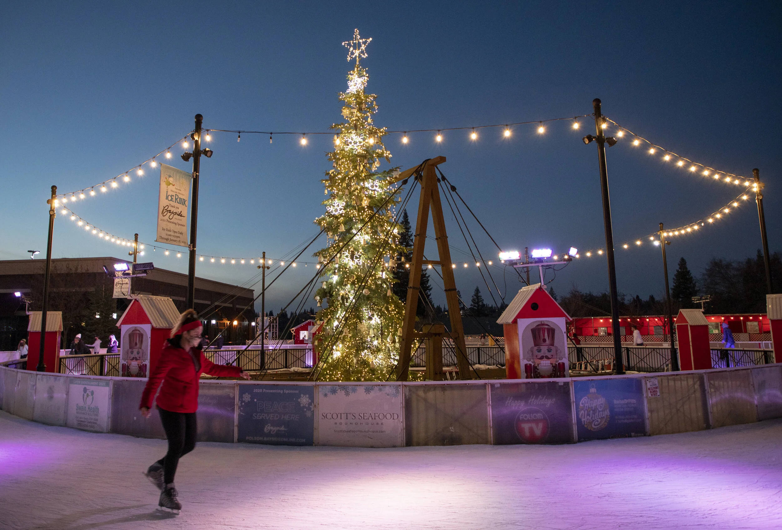 Student ChoiceA skater socially distances with her mask on while gliding along the ice in Historic Folsom at the Folsom, Ca ice skating rink that opens up every year during the holidays. Photo taken by: Sarah Hussey