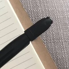 The ultra fine end cap of the Sharpie fits snugly over the fine end’s cap.