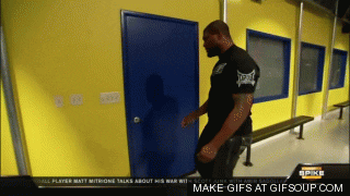 Man opening and then beating up a door, ripping it to shreds. (credit: giphy.com)