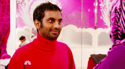 GIF of man looking awkwardly delighted. (credit: giphy.com)