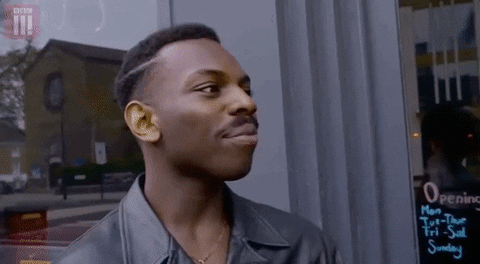 GIF of man pointing to his temple, indicating that he’s telling someone to think about something. (credit: giphy.com)