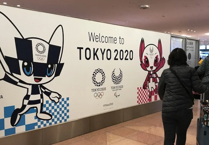 Image of a big “Welcome to Tokyo 2020” sign seen after getting through customs.
