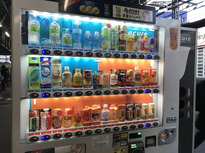 Picture of a vending machine found at a train station.