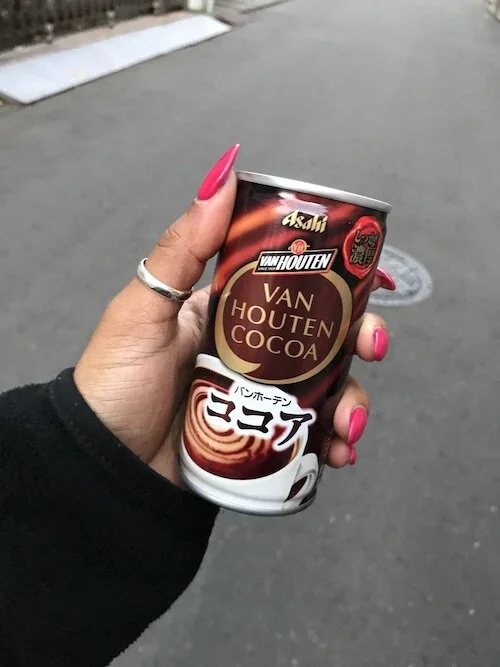 Image of me holding a can of hot cocoa.