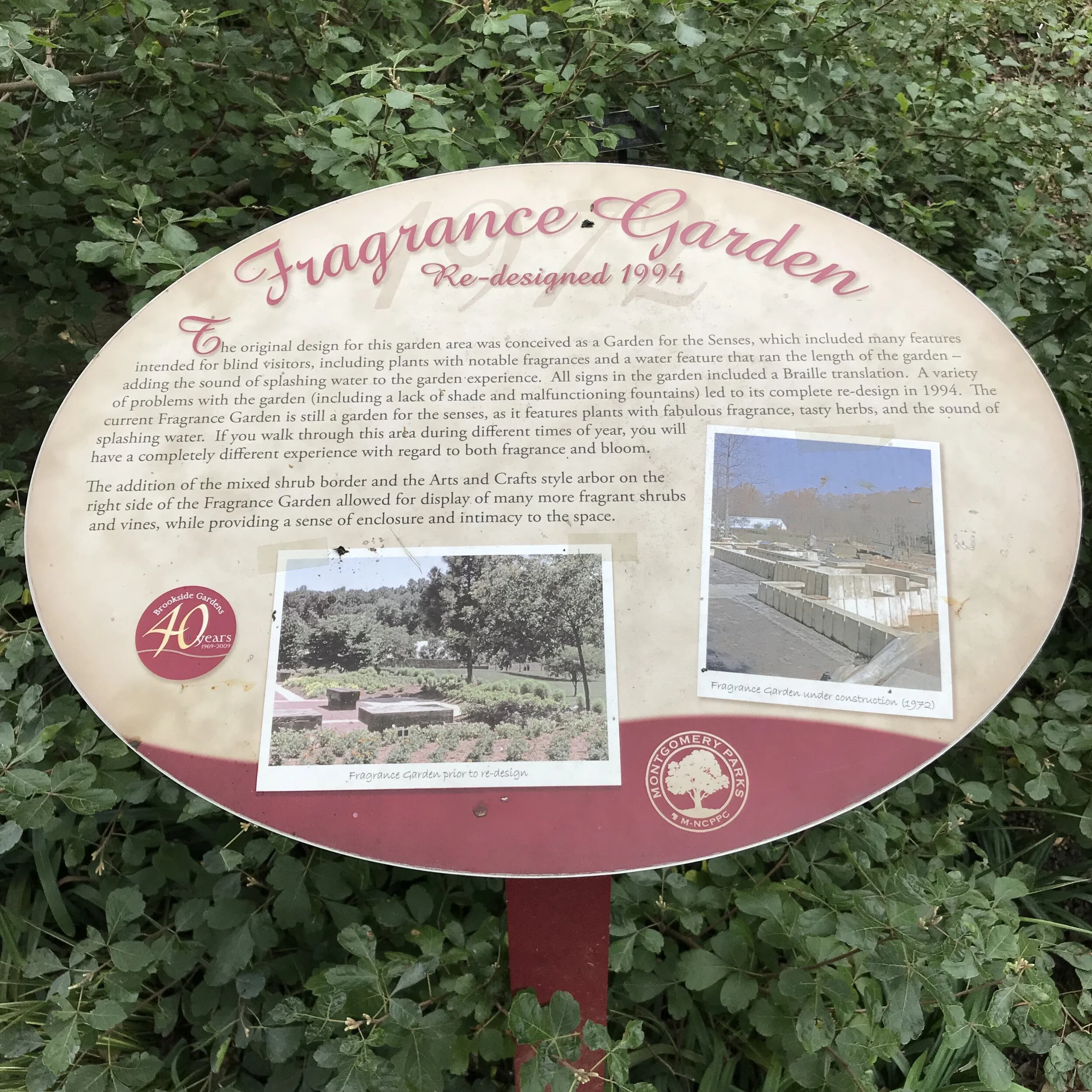 Image of a sign at the entrance of the Fragrance Garden describing the area and its history.