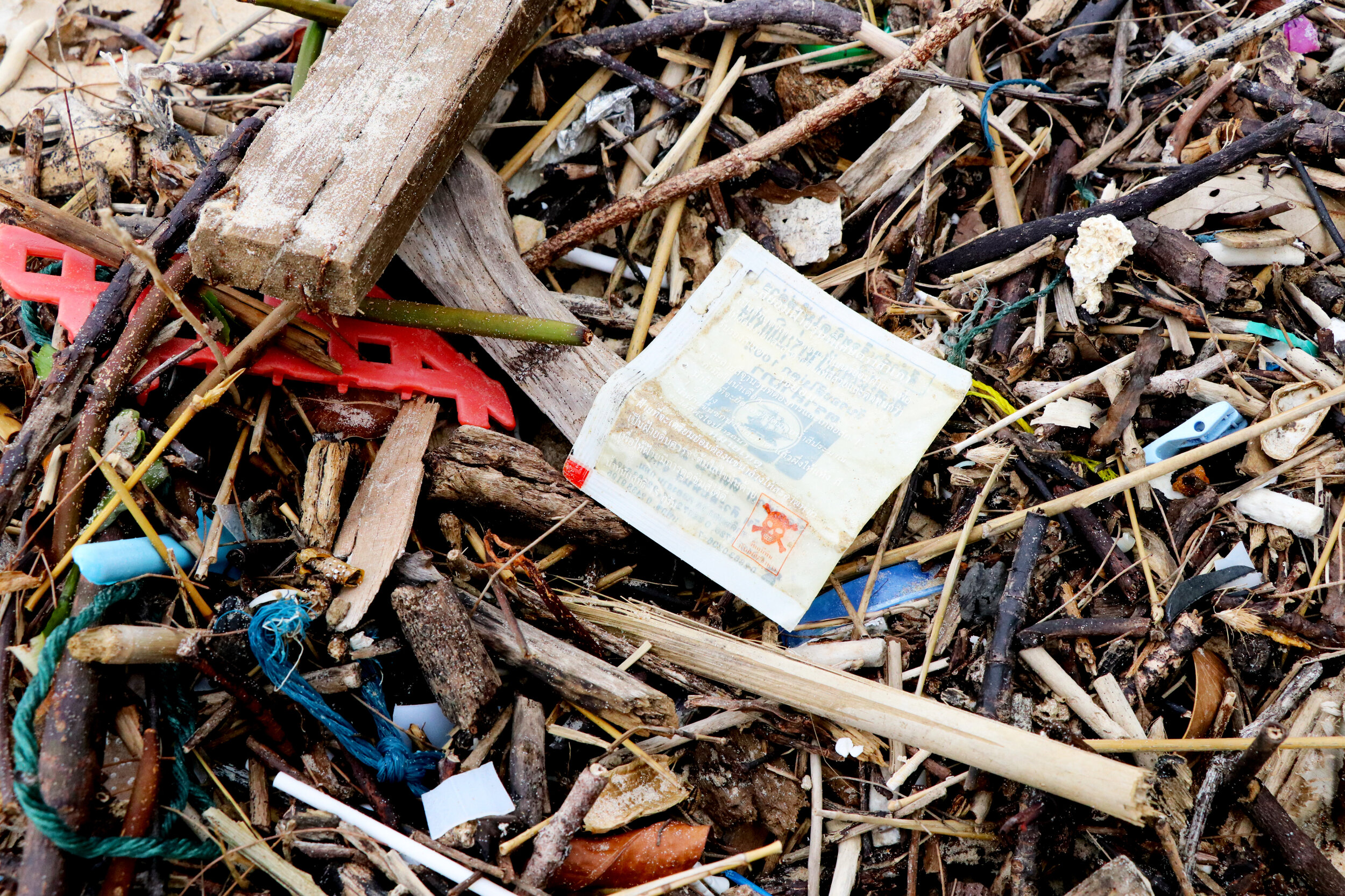 "Plastic on Nai Harn Beach, Rawai, Phuket, Thailand," by Erica Cirino. Photo. (Copy)