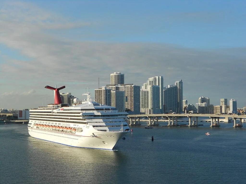 A large cruise ship sails across the Port of Miami. Photo: Nbx909