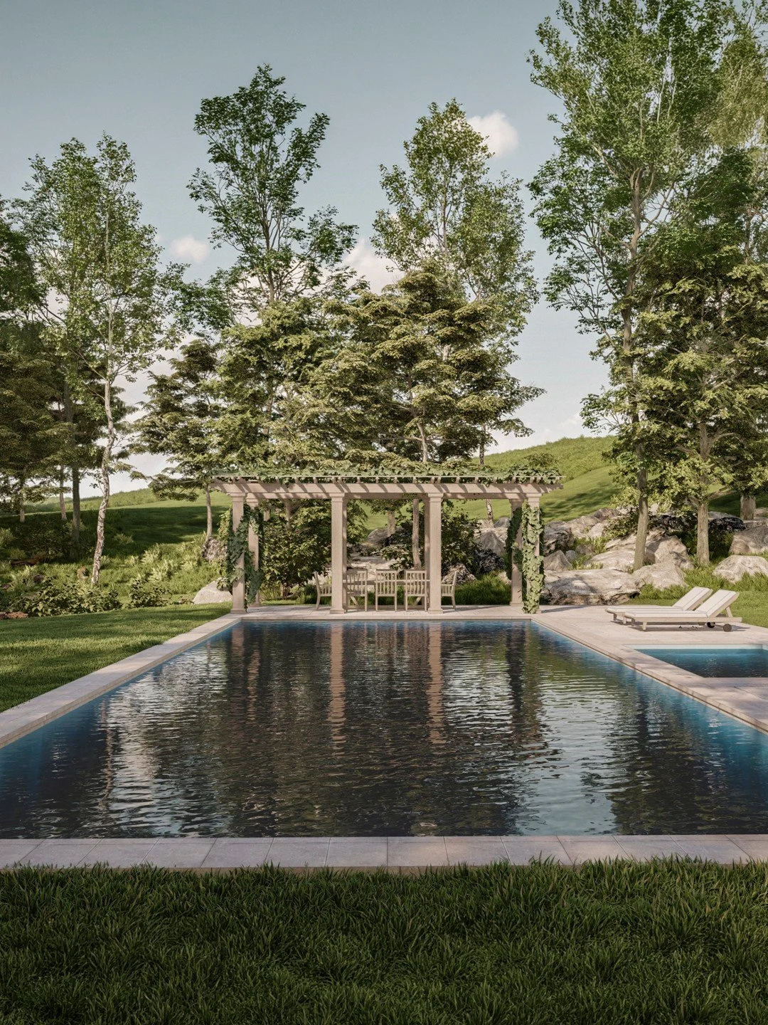 Set high above the Hudson River in Garrison, NY, this pool and stone terrace were designed to embrace the landscape and frame expansive river views. Nestled into the natural rock formations, a custom wood pergola provides shade and creates an intimat