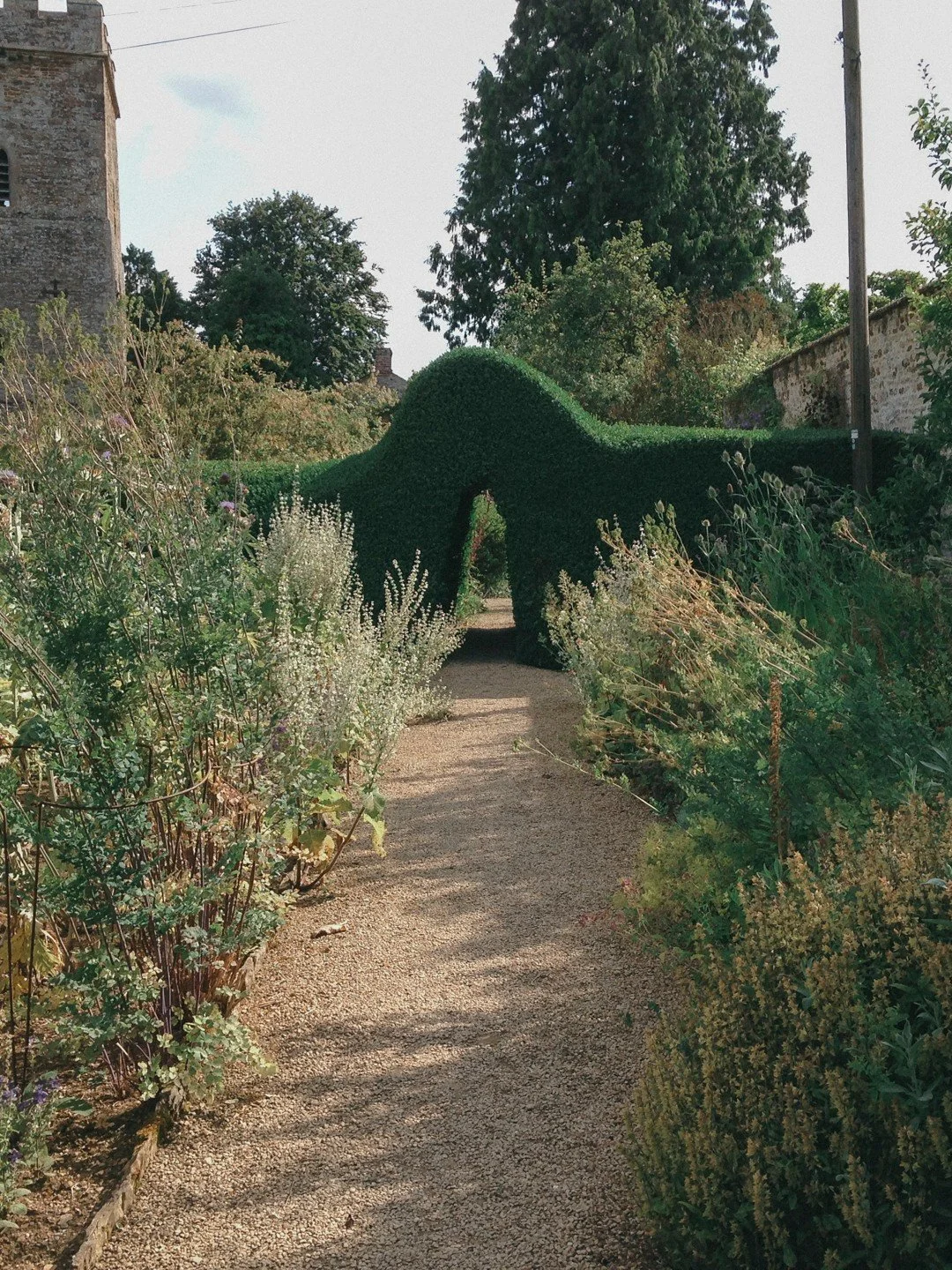 The art of moving through a garden is just as important as the spaces themselves.

Doors, gates, arches and passages create moments of transition, revealing new rooms, changing perspectives and encouraging exploration. At Rousham Hall, beautifully ag