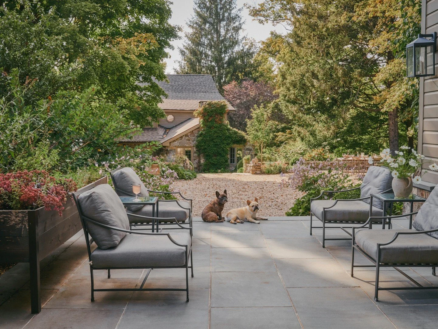 One of our recent projects explores the luxury of space that country properties offer, creating a landscape that works with both rugged natural surroundings and refined garden design.

Hard landscaped areas for seating, entertaining, and quiet moment