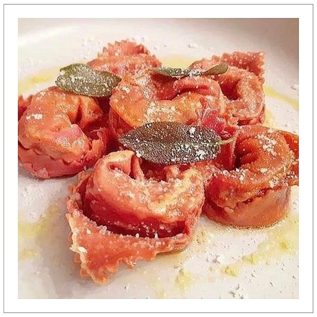 Ravioli radicchio rosso, speck, burro e salvia