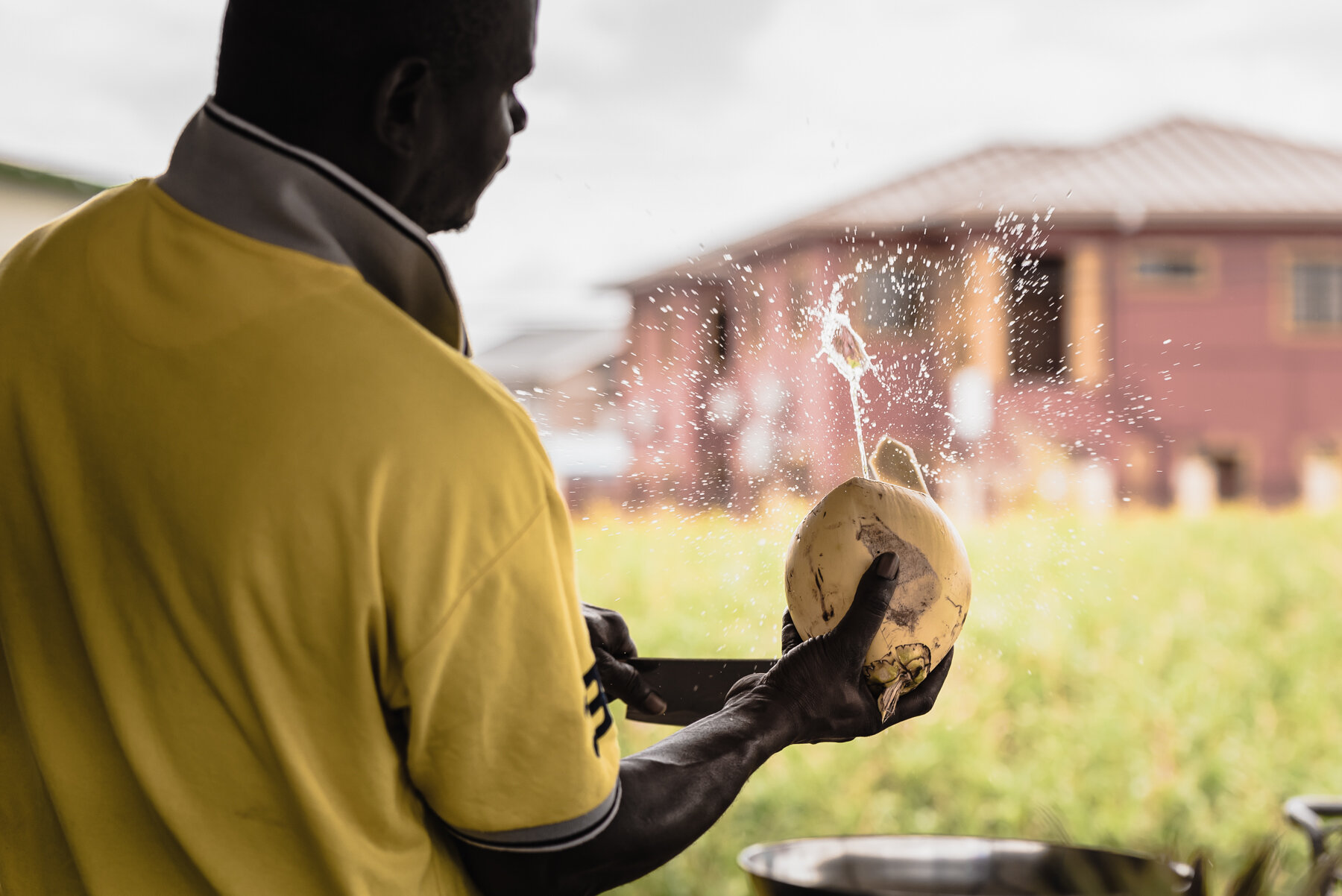 "The living water" 2018. Coconut Vendor in action.