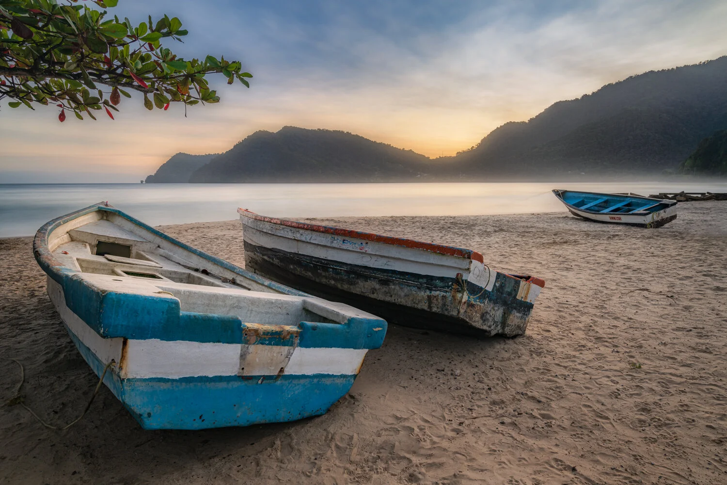 "All dressed up and nowhere to go" 2020. Boats ashore on a hazy morning at Maracas beach, Trinidad.