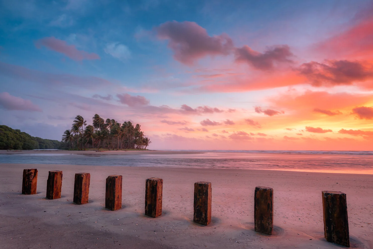 "Manzanilla sunrise" 2018. A historical scene at this point as these recognizable piles in the sand no longer exist after coastal engineering works in the same location in 2019.