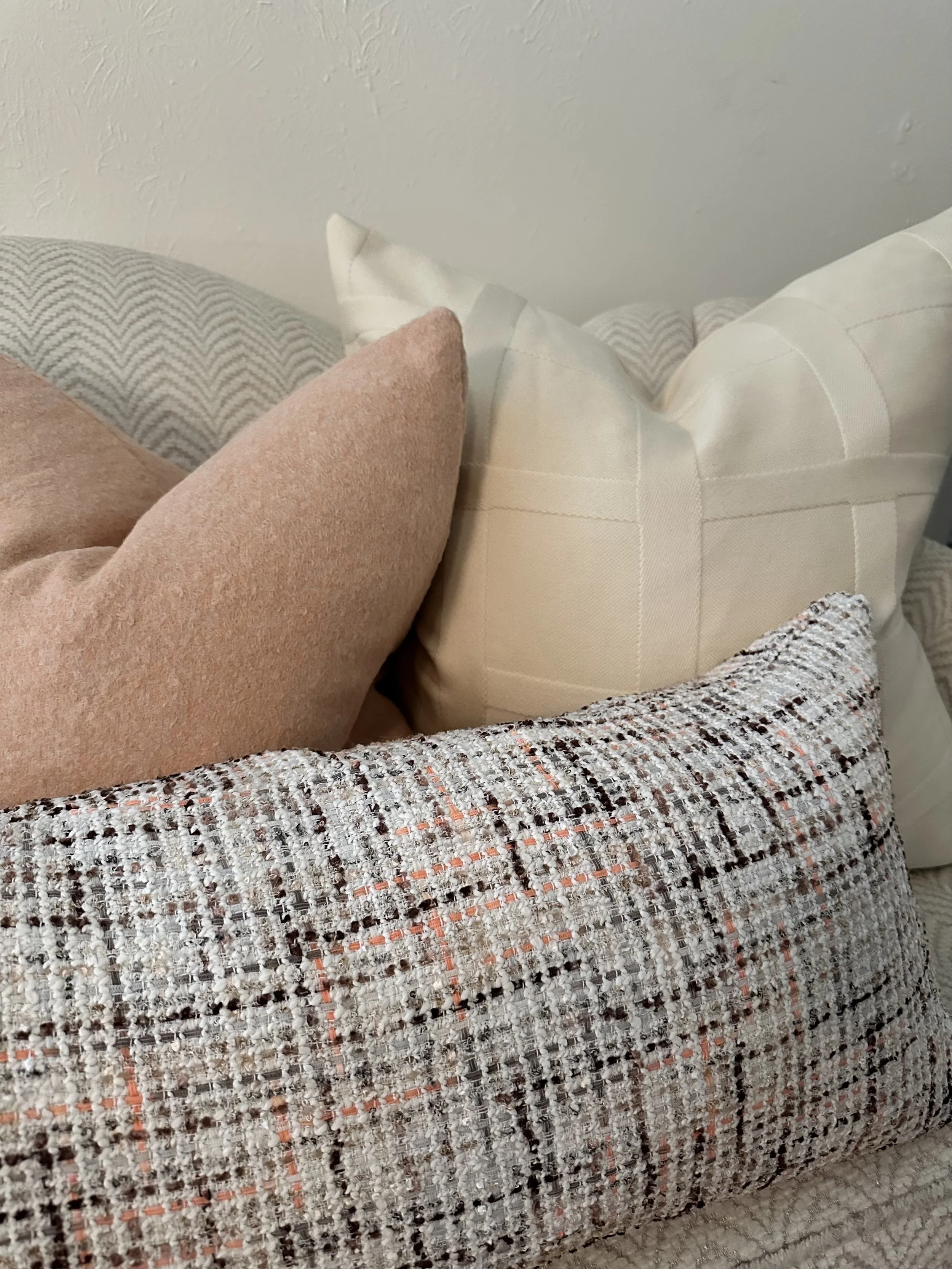 WhiteandPeachBouclePillow.jpeg