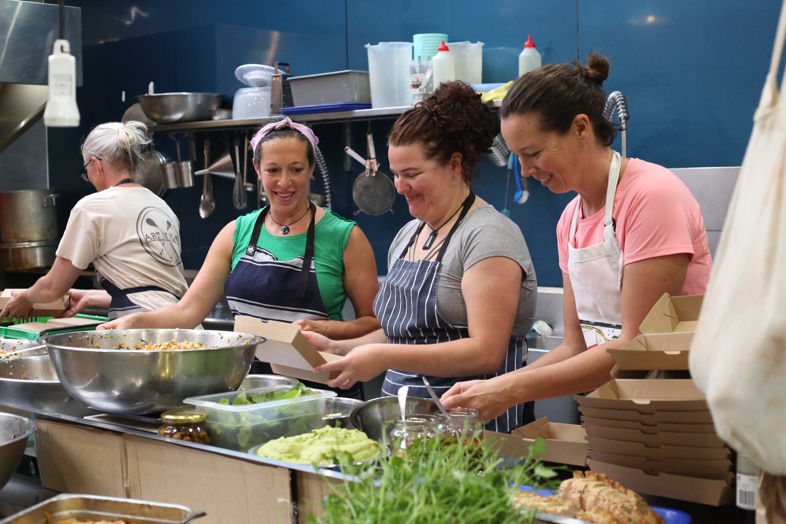 Mt Victoria - cooking team happily hard at work