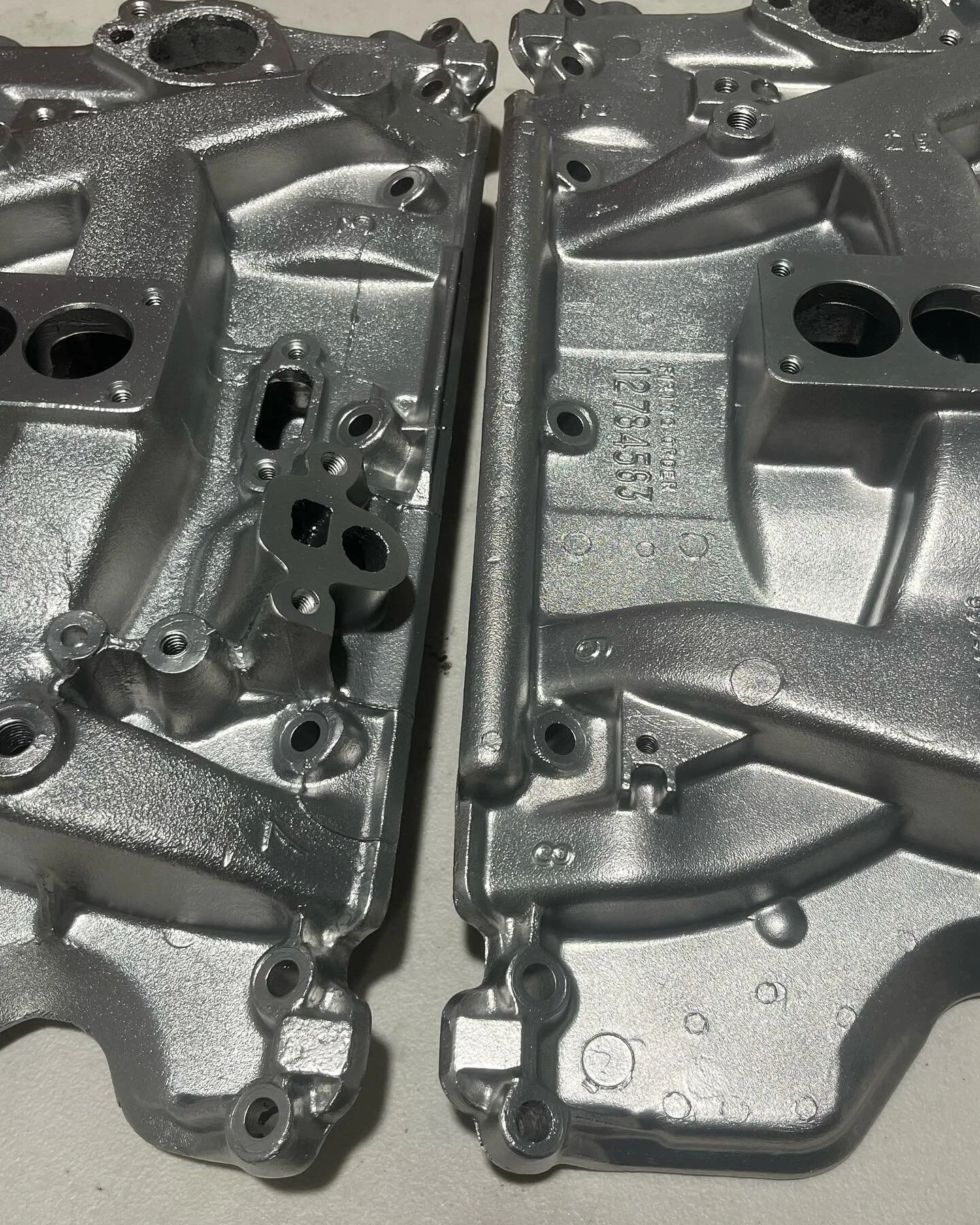 Vapour blasting completed on a couple of old Holden V8 manifolds ready for refitting