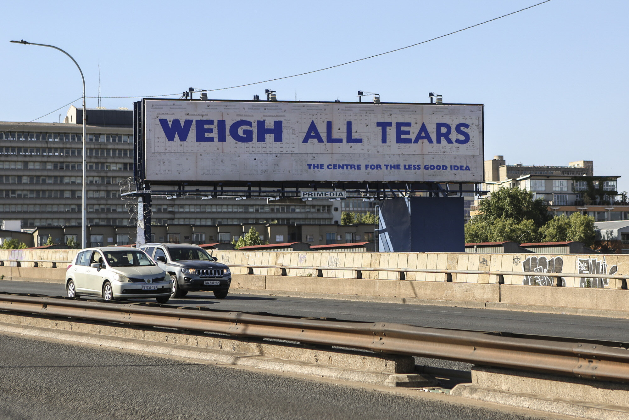 Billboard art makes the questions bigger