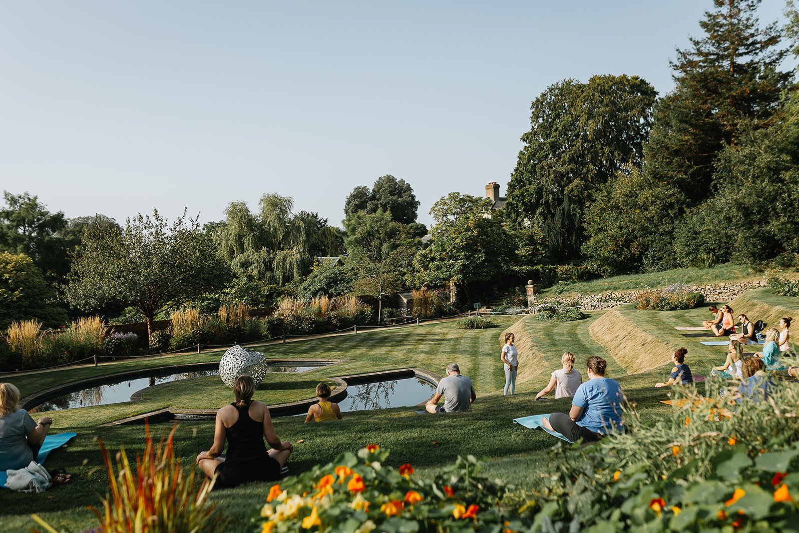 Morning Yoga in the Walled Garden with Ashlyn from Fisical Mind & Body