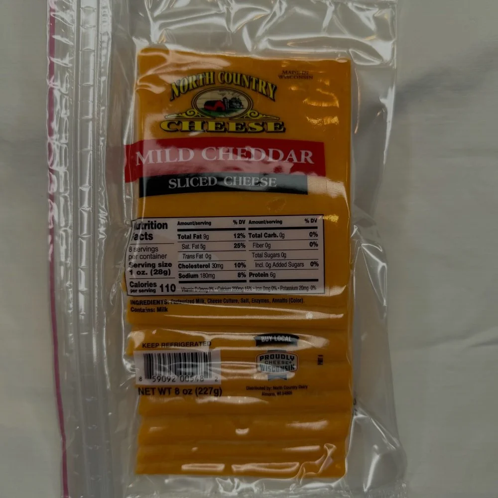 NORTH COUNTRY MILD CHEDDAR SLICES.jpg