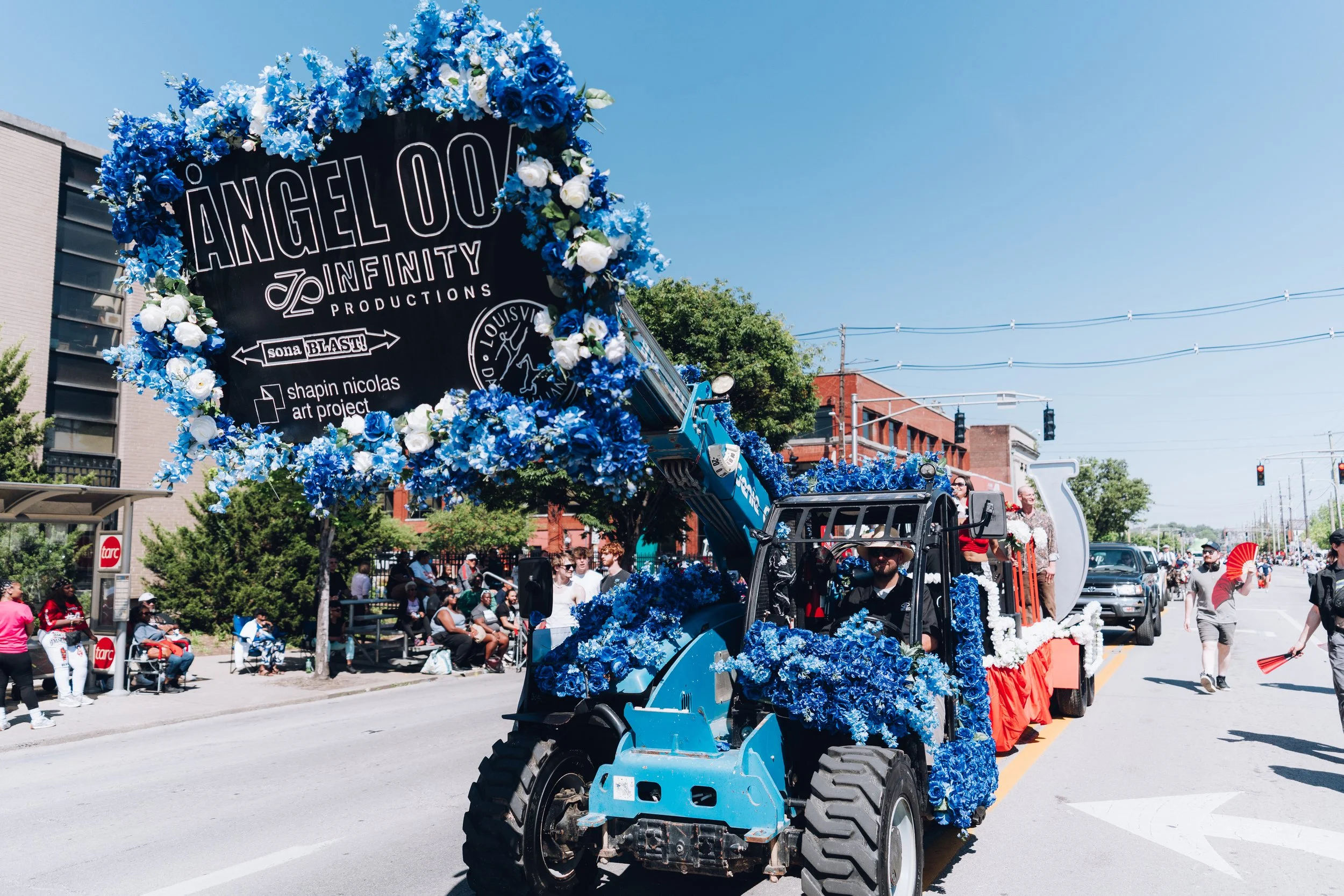   ÅNGEL 004 performing at the Kentucky Derby Pegasus Parade in April 2026.  